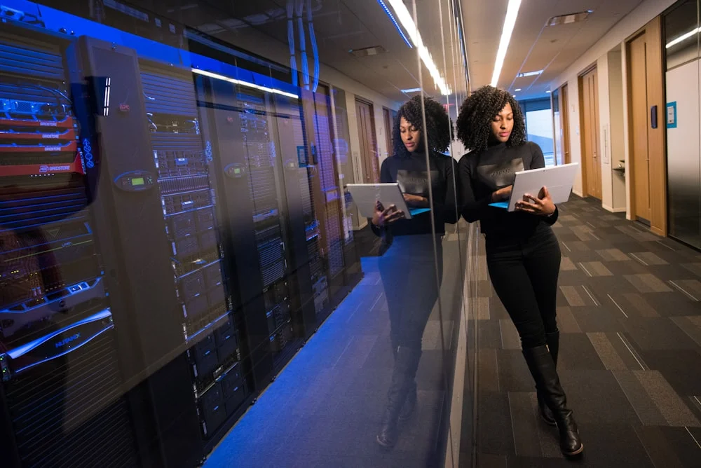 Woman working with AI technology in modern workspace